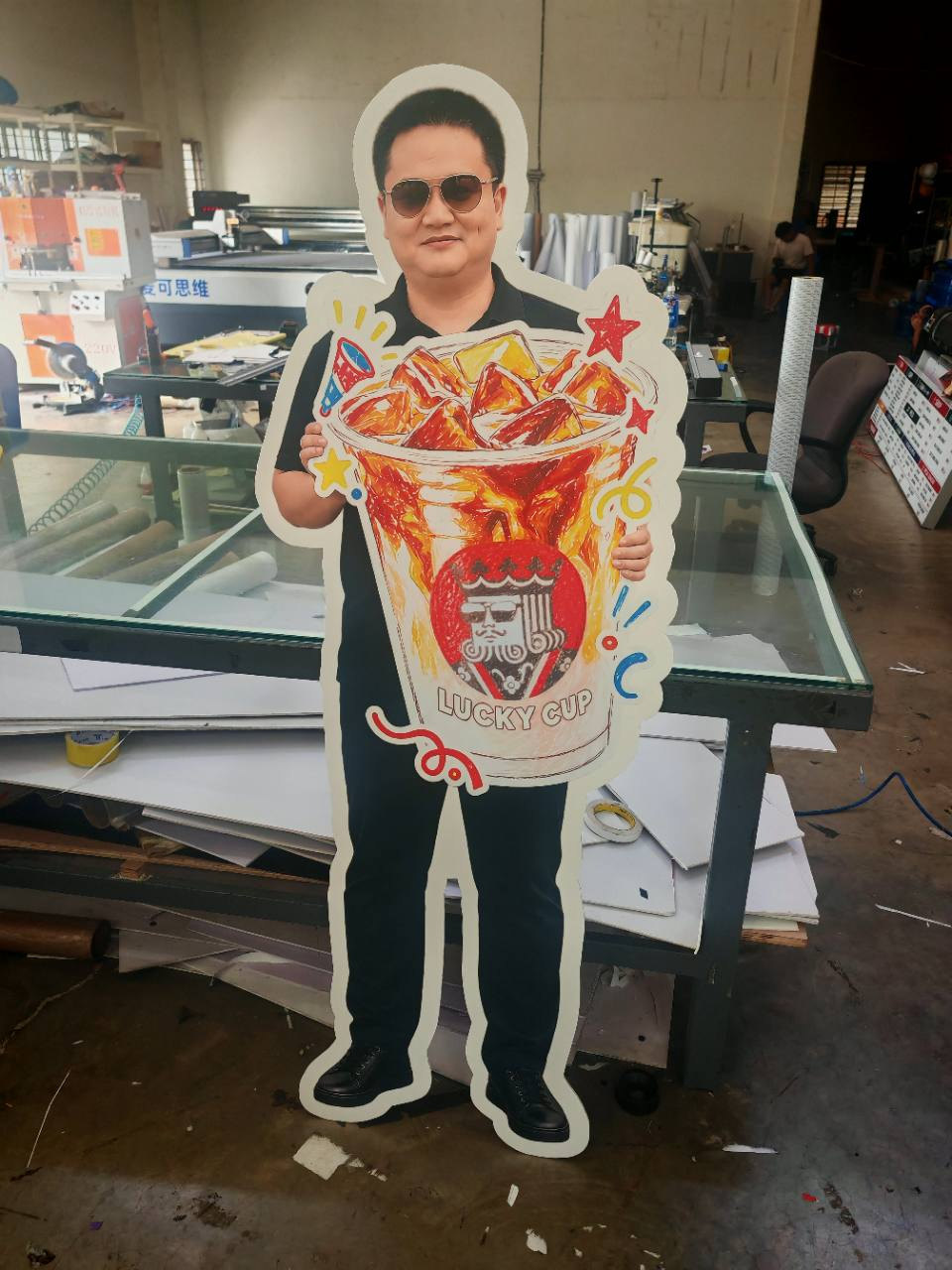 Person-and-drink promotional display